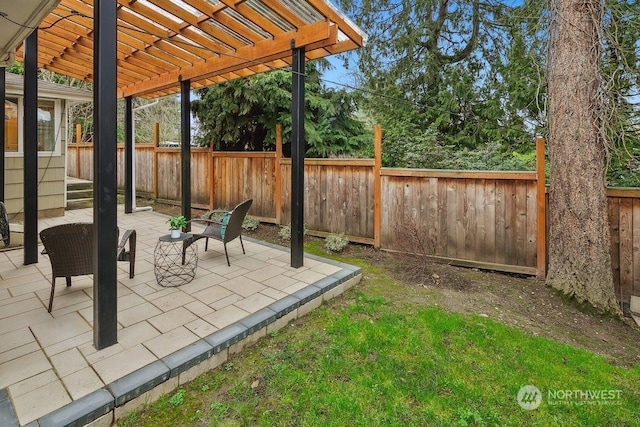 view of patio featuring a pergola