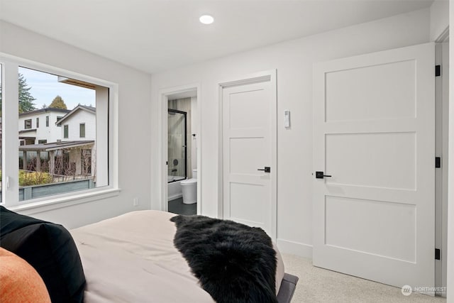 bedroom featuring ensuite bathroom