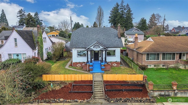 view of front facade with a front yard