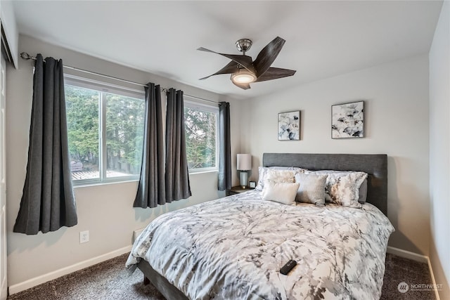 carpeted bedroom featuring ceiling fan