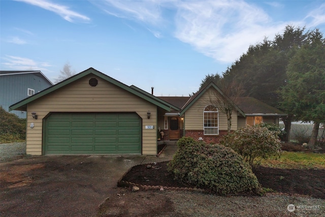 ranch-style house with a garage