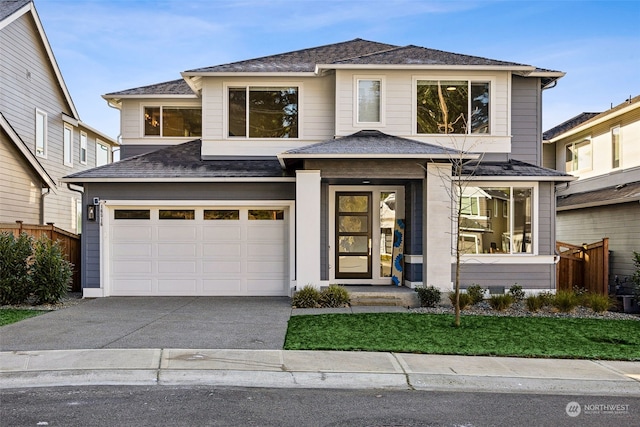 view of front of property featuring a garage