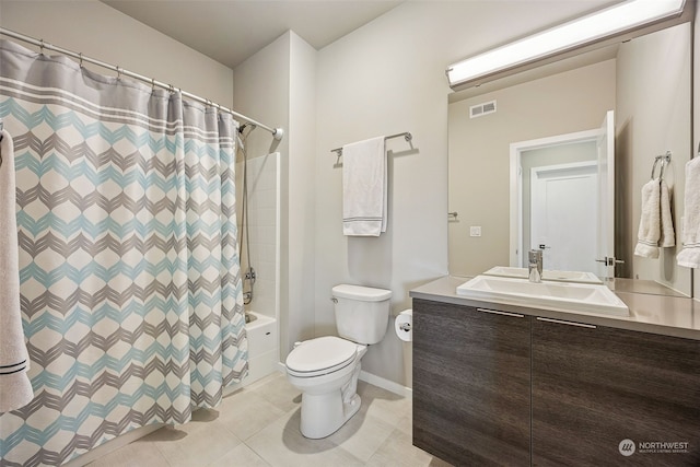 full bathroom featuring toilet, shower / tub combo with curtain, tile patterned floors, and vanity