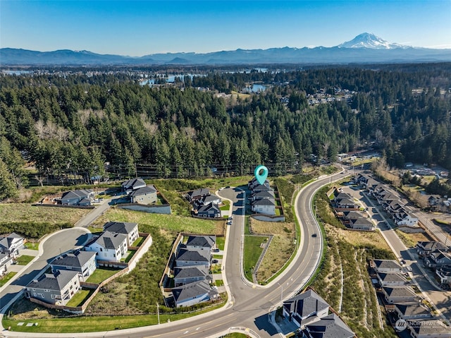 drone / aerial view featuring a mountain view