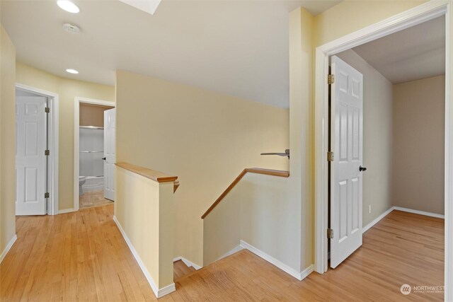 corridor featuring light hardwood / wood-style flooring