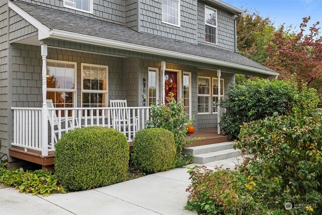 doorway to property featuring a porch