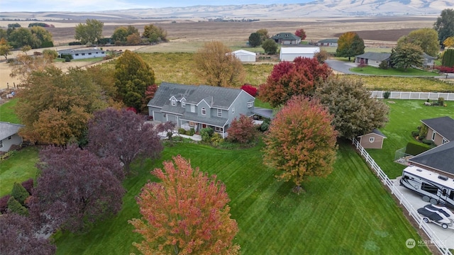 drone / aerial view featuring a mountain view