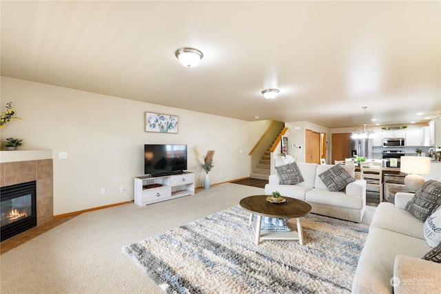 carpeted living room with a fireplace