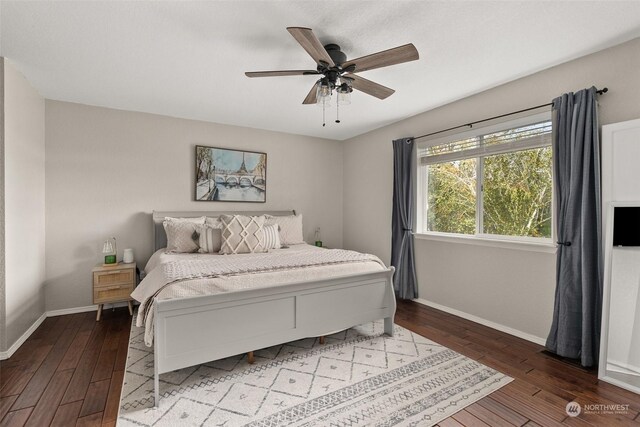 bedroom featuring ceiling fan and hardwood / wood-style flooring