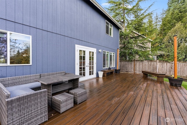 wooden deck featuring french doors