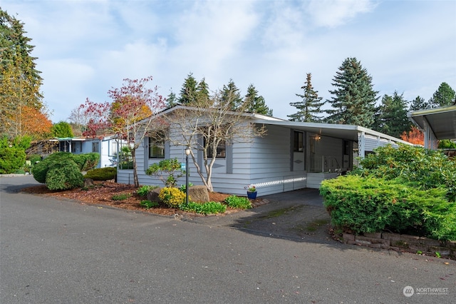 view of front facade featuring a carport