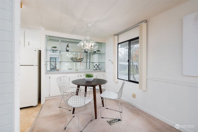 view of carpeted dining room