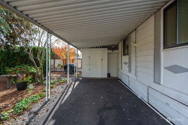 view of patio / terrace featuring a carport