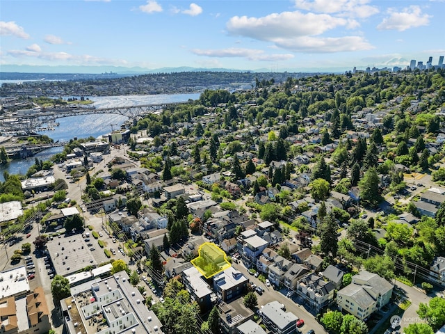 drone / aerial view with a water view