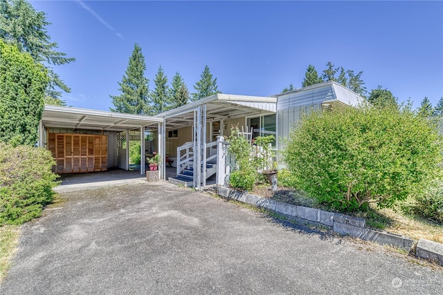 view of front of house with a carport