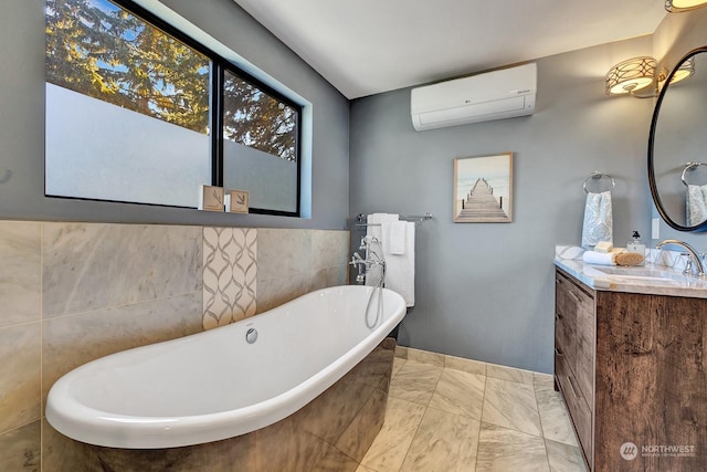 bathroom featuring an AC wall unit, a tub to relax in, and vanity