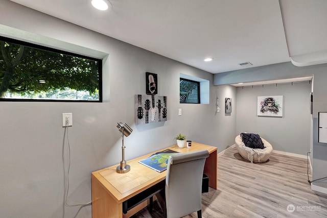 office area with light wood-type flooring