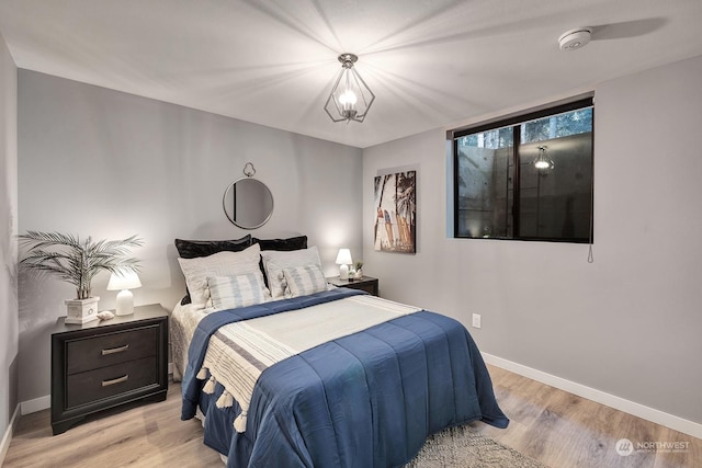 bedroom with light wood-type flooring