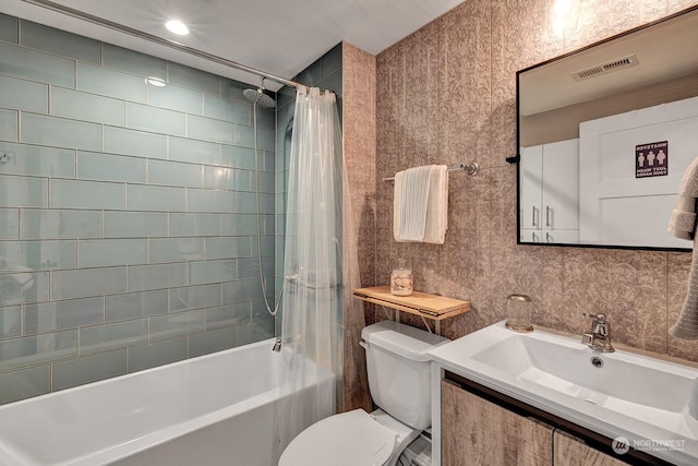 full bathroom with toilet, vanity, and shower / bathtub combination with curtain