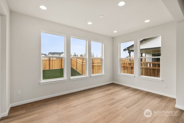 interior space featuring a healthy amount of sunlight and light hardwood / wood-style floors