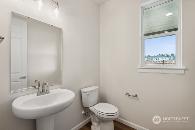 bathroom with toilet and sink