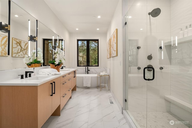 bathroom featuring vanity and plus walk in shower