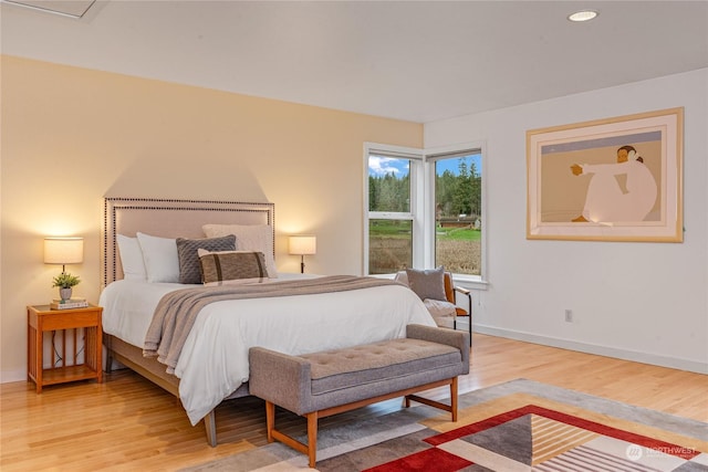 bedroom featuring hardwood / wood-style flooring