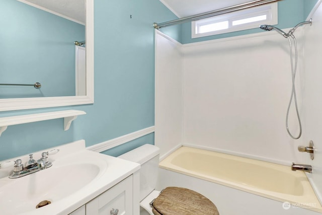 full bathroom featuring toilet,  shower combination, and vanity