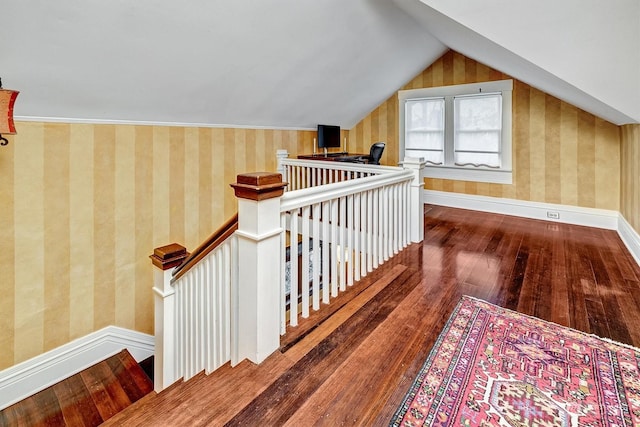 bonus room featuring hardwood / wood-style flooring and lofted ceiling