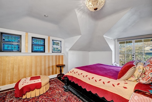 bedroom featuring vaulted ceiling