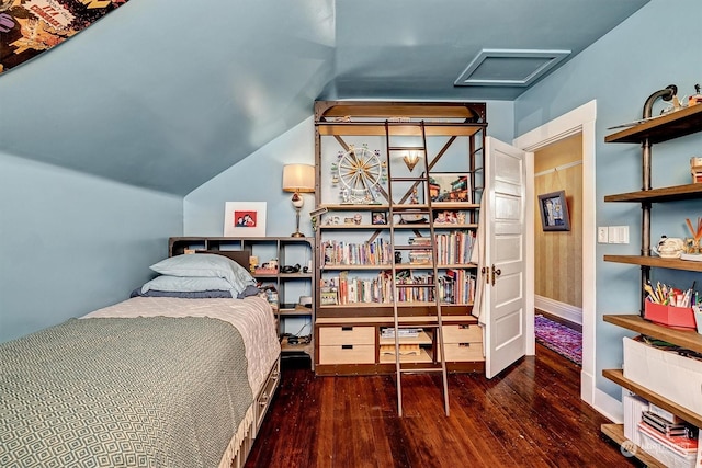 bedroom with dark wood-type flooring and vaulted ceiling