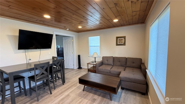 living room featuring crown molding, wood ceiling, and light wood-type flooring