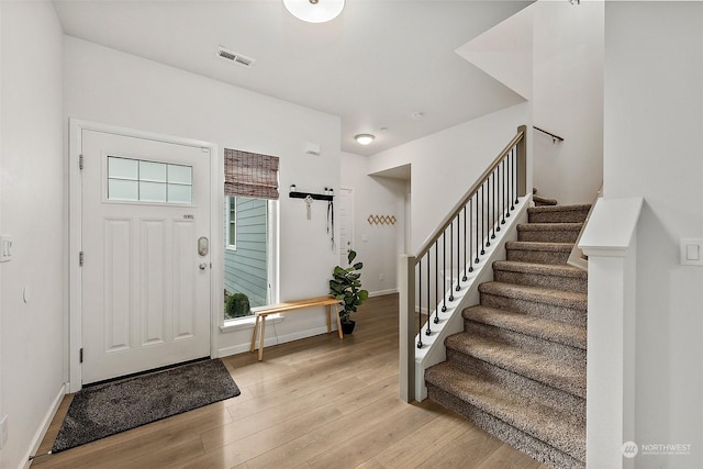 entrance foyer with light hardwood / wood-style flooring