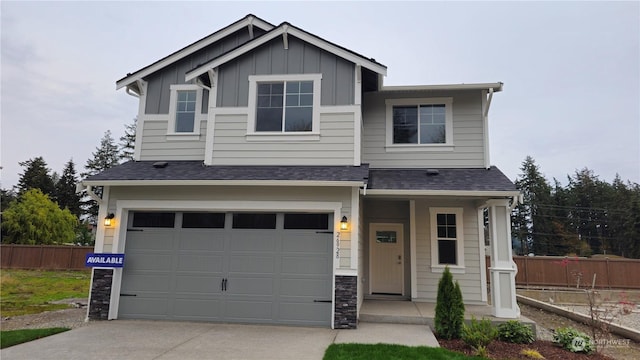 view of front of property with a garage