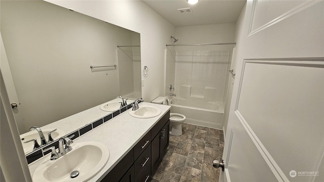 full bathroom with toilet, vanity, and shower / bathing tub combination