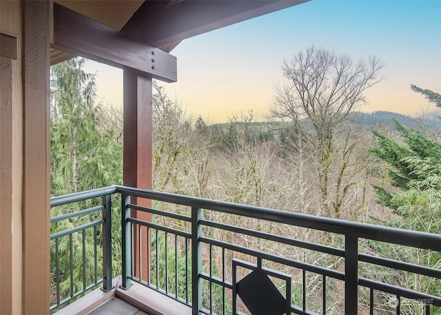 view of balcony at dusk