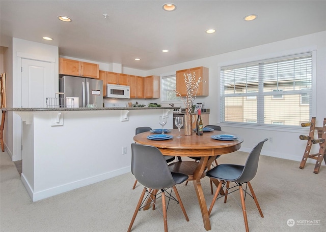 view of carpeted dining room