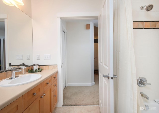 bathroom featuring vanity, tile patterned floors, and shower / bath combination with curtain