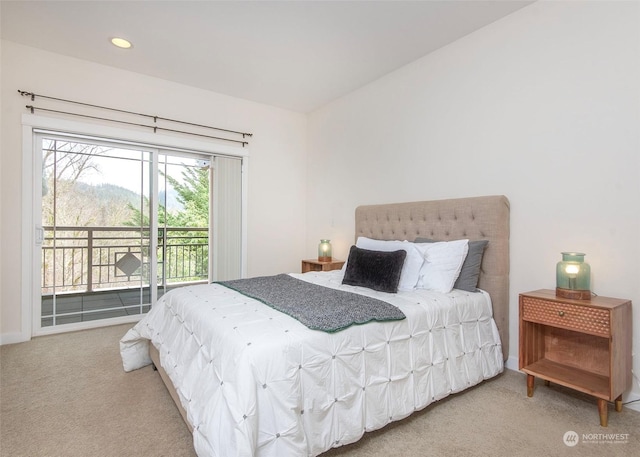 bedroom featuring carpet floors and access to outside