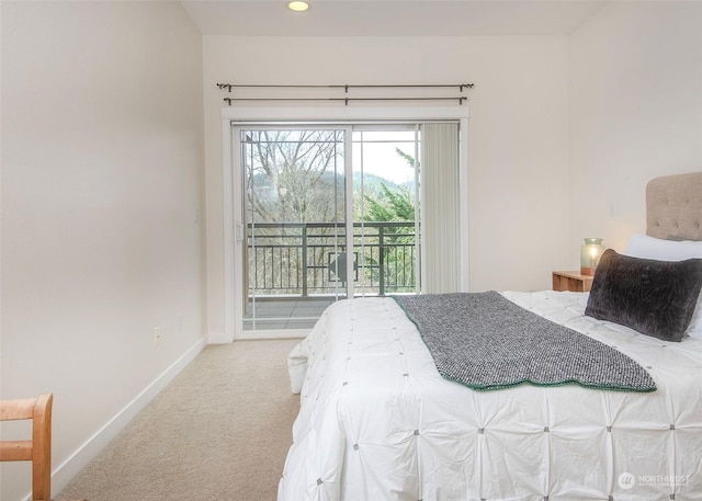 carpeted bedroom with access to outside