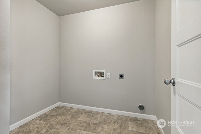 laundry area featuring baseboards, hookup for an electric dryer, washer hookup, and laundry area