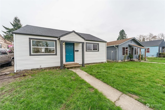 view of front of home with a front yard