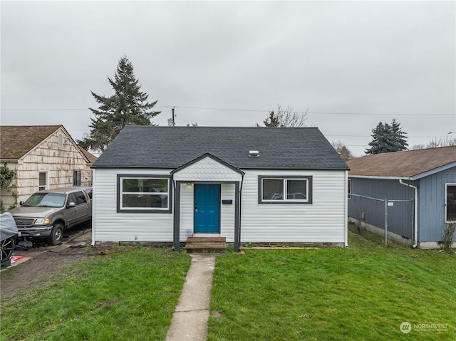 bungalow with a front yard