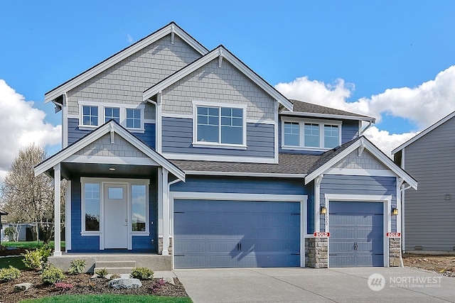 craftsman-style home featuring a garage