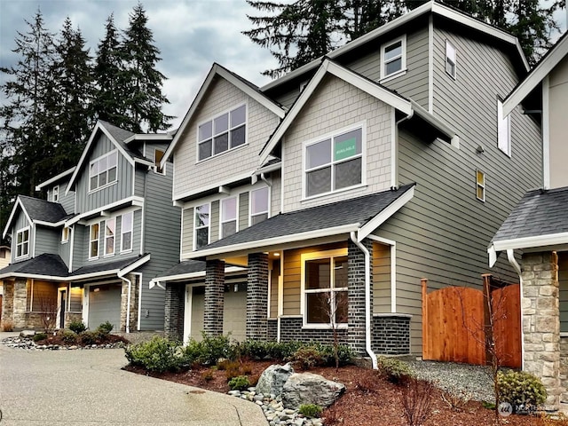 craftsman inspired home with a garage