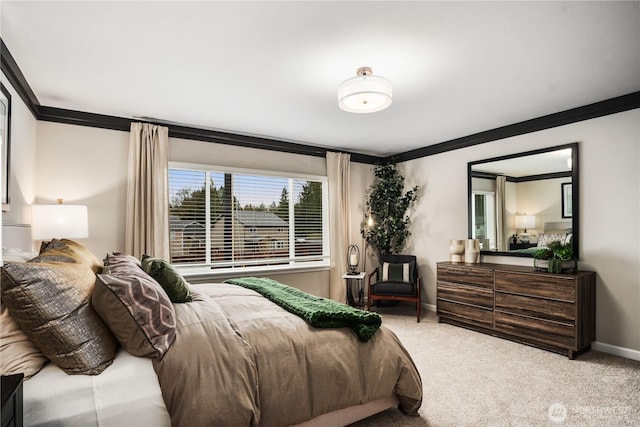 bedroom featuring carpet floors, baseboards, and ornamental molding