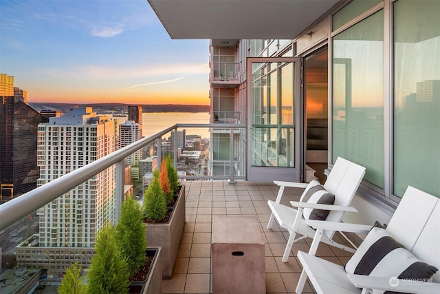 balcony at dusk with a water view