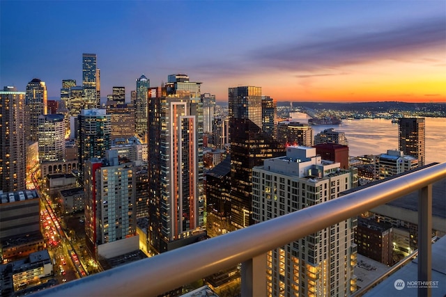 property's view of city featuring a water view