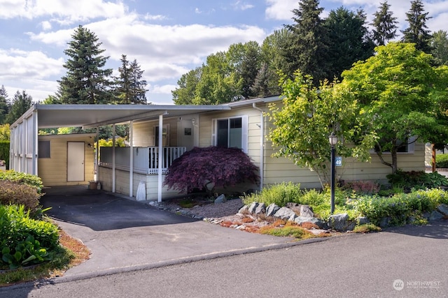 view of front of house with a carport