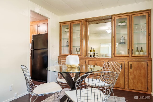 dining room featuring dark wood-type flooring